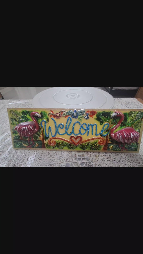 Flemingo in garden welcome board